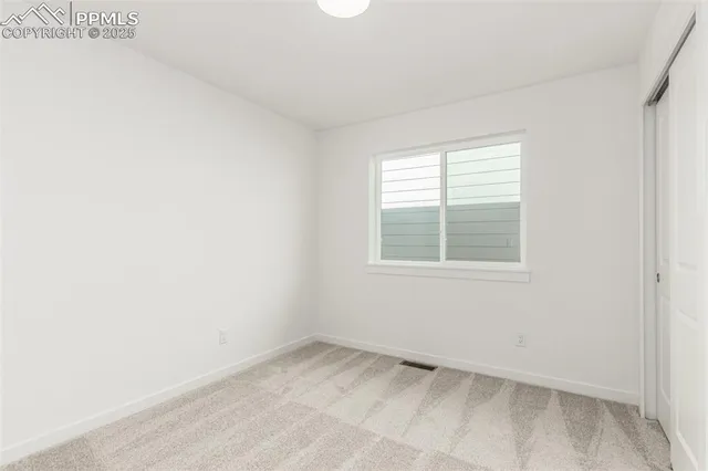 a bathroom with double vanity sink and a mirror