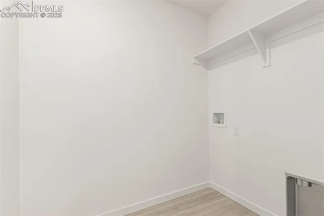 a view of a room with an empty space