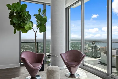 a kitchen with a refrigerator and an oven