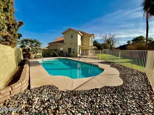 a view of a house with a swimming pool