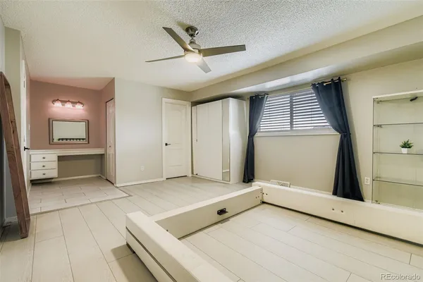 a view of a livingroom with a kitchen