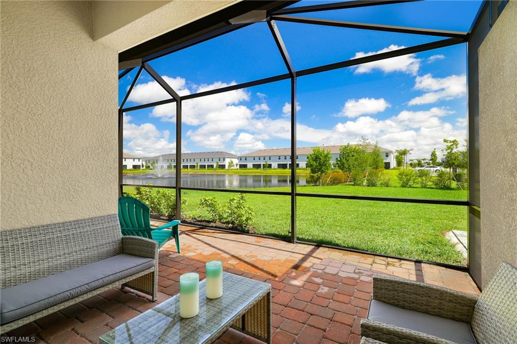 2052 Vermont Lane Naples, FL 34120 - Photo 23 of 35 a view of an outdoor sitting area