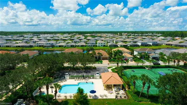 an aerial view of a house with a garden