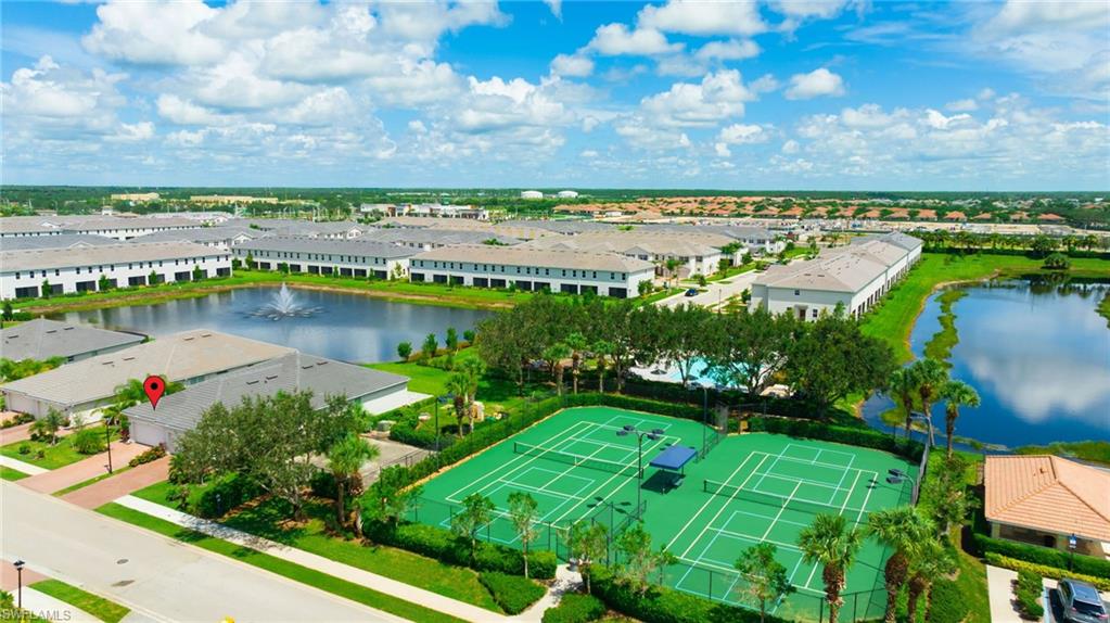 2052 Vermont Lane Naples, FL 34120 - Photo 29 of 35 a view of a lake with a city