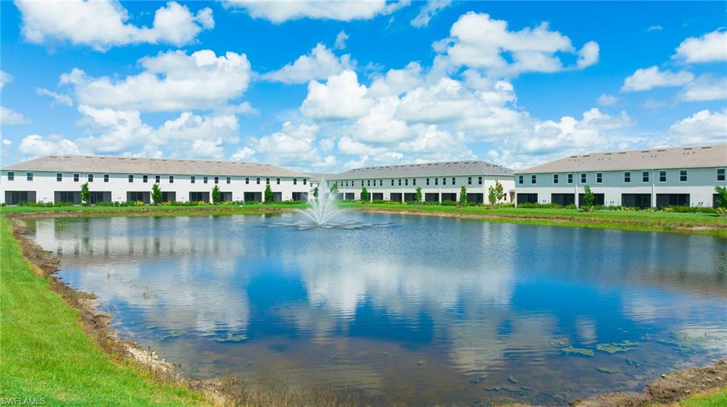 2052 Vermont Lane Naples, FL 34120 - Photo 35 of 35 a view of a lake with a city