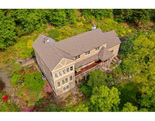111 Old County Road Lincoln, MA 01773 - Photo 1 of 36 a aerial view of a house with a yard and lake view