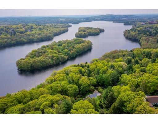 111 Old County Road Lincoln, MA 01773 - Photo 36 of 36 a view of a lake with a houses