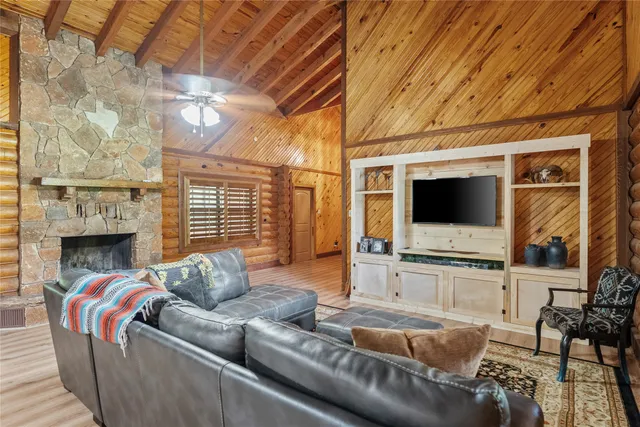 a bedroom with a bed and a chair