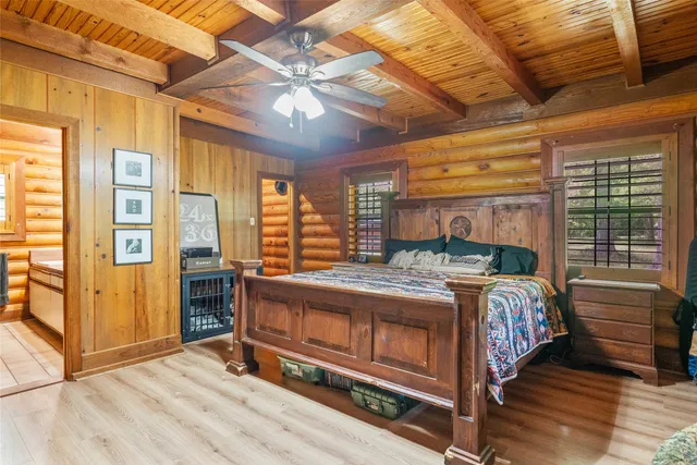 a bathroom with a shower and a sink