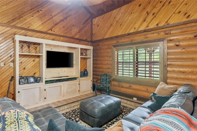 a view of a porch with wooden floor and outdoor space
