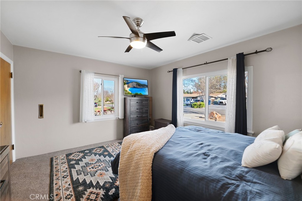 1612 Bellevue Road Redlands, CA 92373 - Photo 16 of 31 a bedroom with a large bed and a window