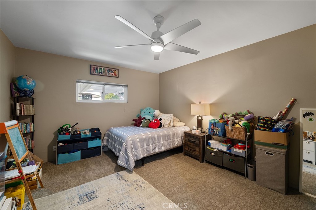 1612 Bellevue Road Redlands, CA 92373 - Photo 17 of 31 a bedroom with bed and window