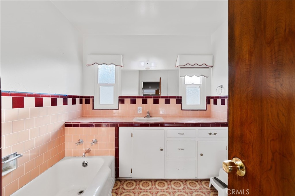 1612 Bellevue Road Redlands, CA 92373 - Photo 19 of 31 a bathroom with a sink and a mirror