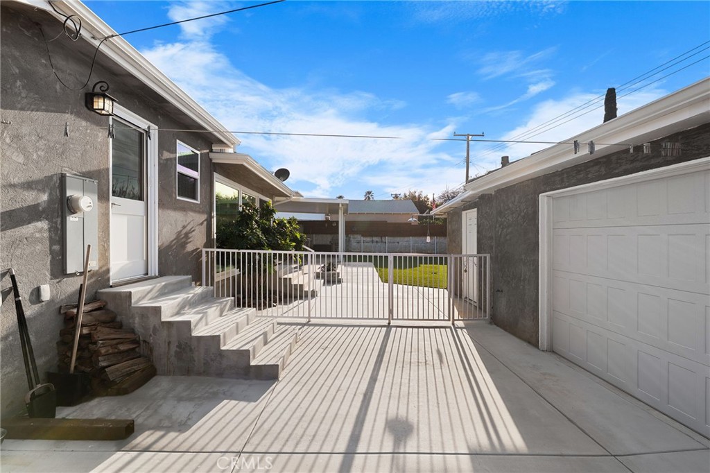 1612 Bellevue Road Redlands, CA 92373 - Photo 22 of 31 a view of balcony with a couch and wooden floor