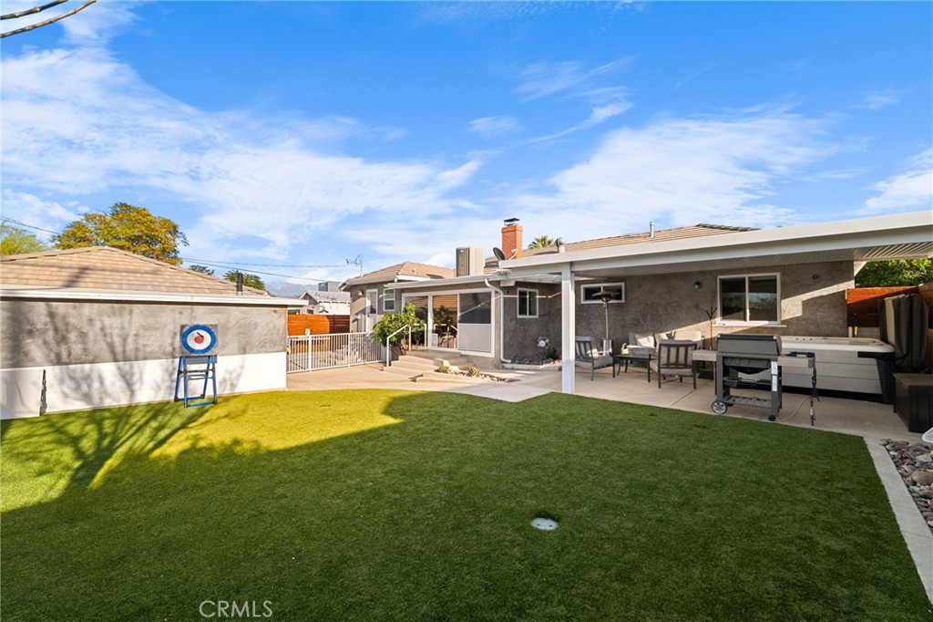 1612 Bellevue Road Redlands, CA 92373 - Photo 26 of 31 a view of a house with swimming pool and sitting area
