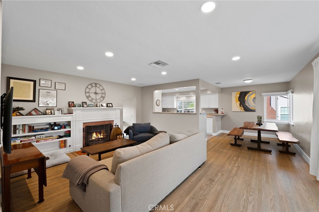 1612 Bellevue Road Redlands, CA 92373 - Photo 3 of 31 a living room with furniture and a fireplace