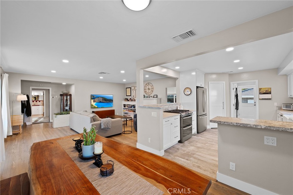 1612 Bellevue Road Redlands, CA 92373 - Photo 6 of 31 a living room with furniture and a wooden floor