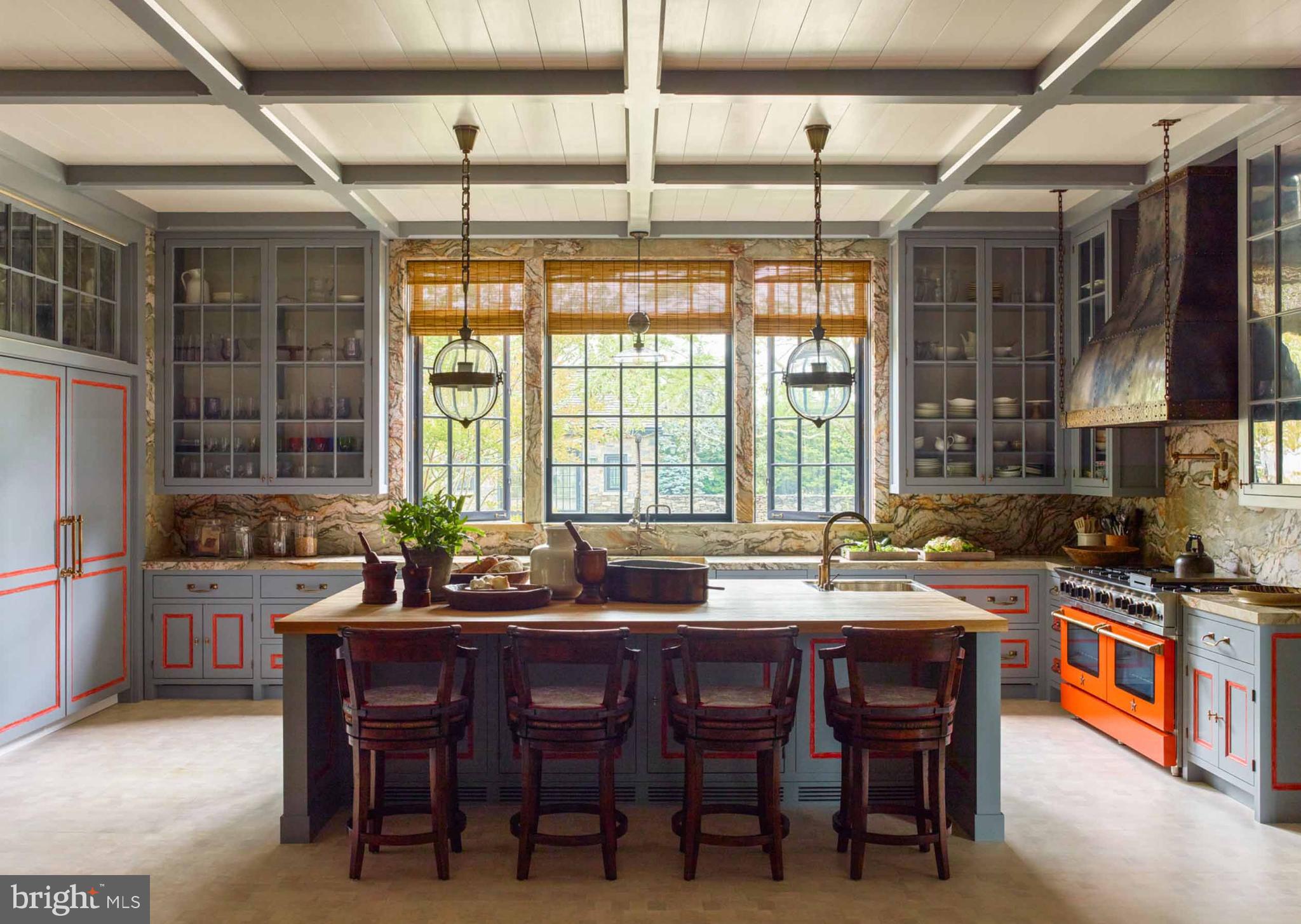 a kitchen with stainless steel appliances granite countertop a sink and a wooden cabinets
