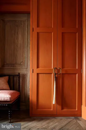 a work room with furniture and wooden floor