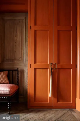 a work room with furniture and wooden floor