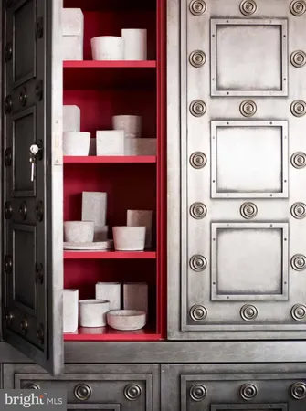 a view of a big house with a big yard and large trees