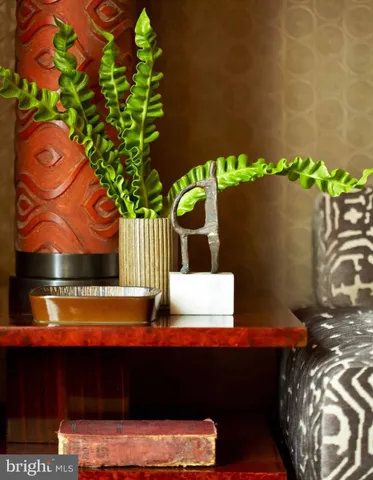 a view of a pathway with a tree in front of it