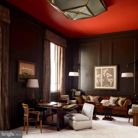 a bedroom with a bed and a fireplace