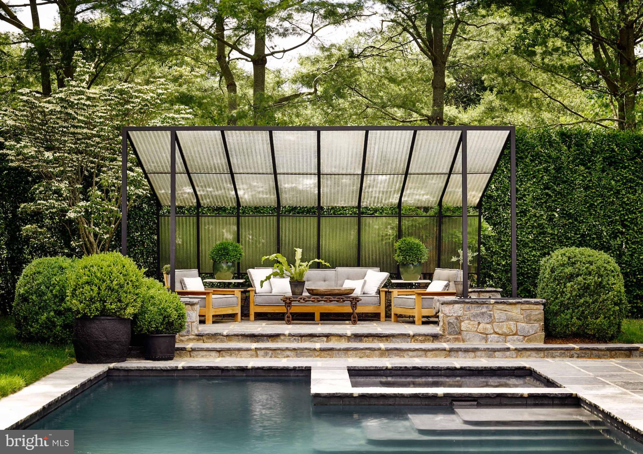 933 Hillside Road Lutherville-Timonium, MD 21093 - Photo 8 of 55 a view of swimming pool with chairs
