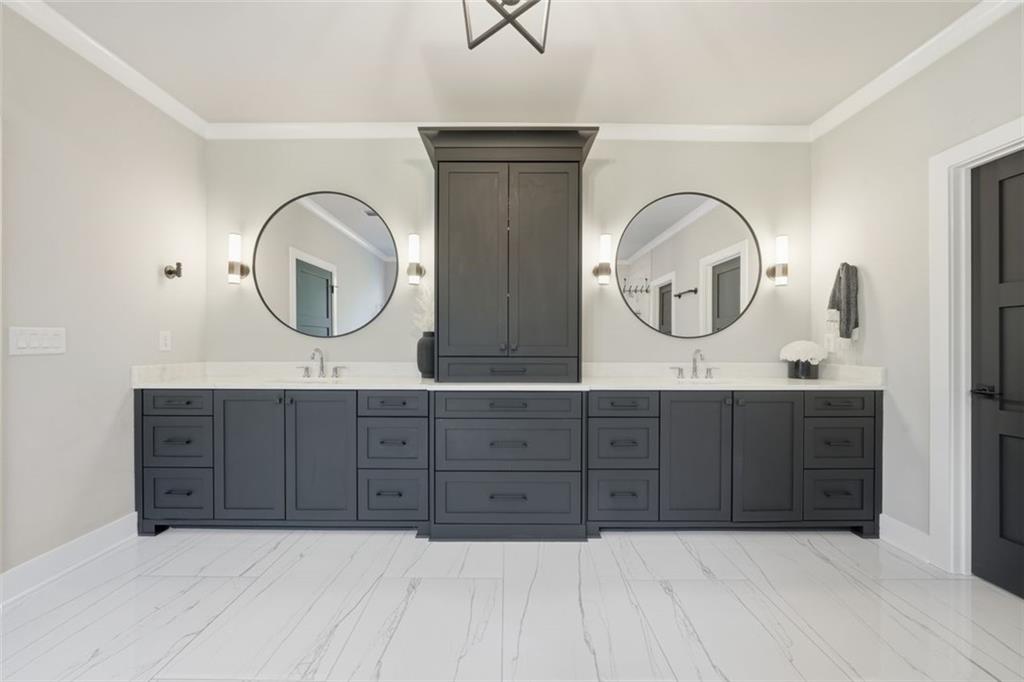 116 Owens Mill Place Canton, GA 30115 - Photo 15 of 65 a bathroom with double vanity sink and a mirror