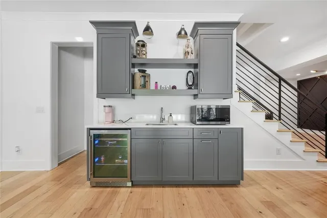 a workspace with furniture window and wooden floor