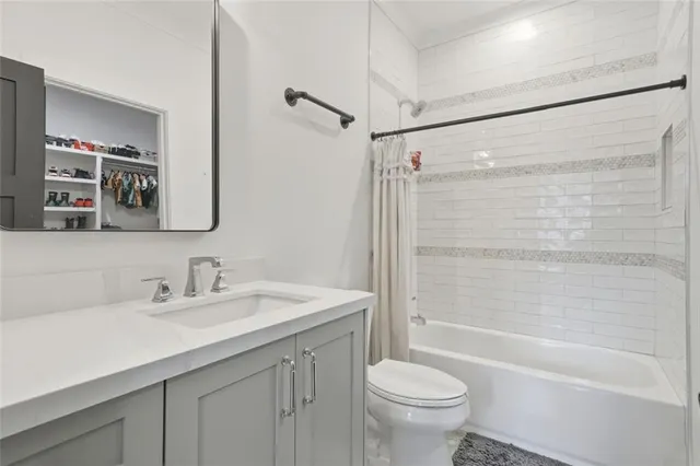 an aerial view of a house with outdoor space