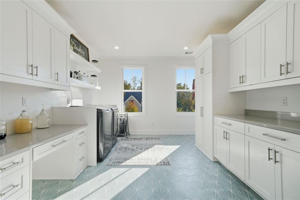 116 Owens Mill Place Canton, GA 30115 - Photo 50 of 65 a kitchen with cabinets and window