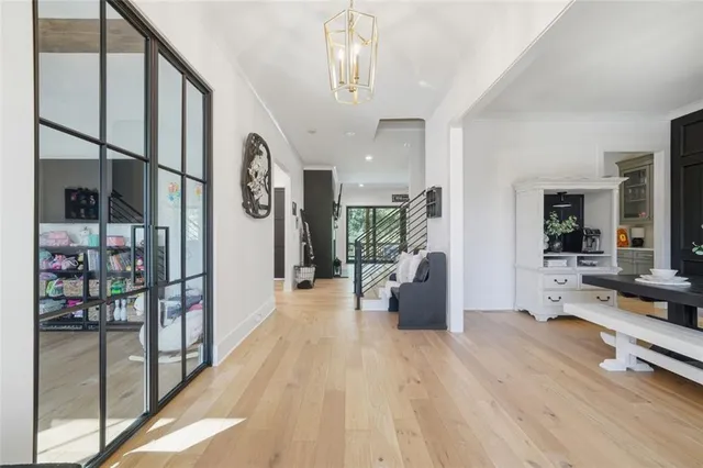 a living room with furniture fireplace and flat screen tv