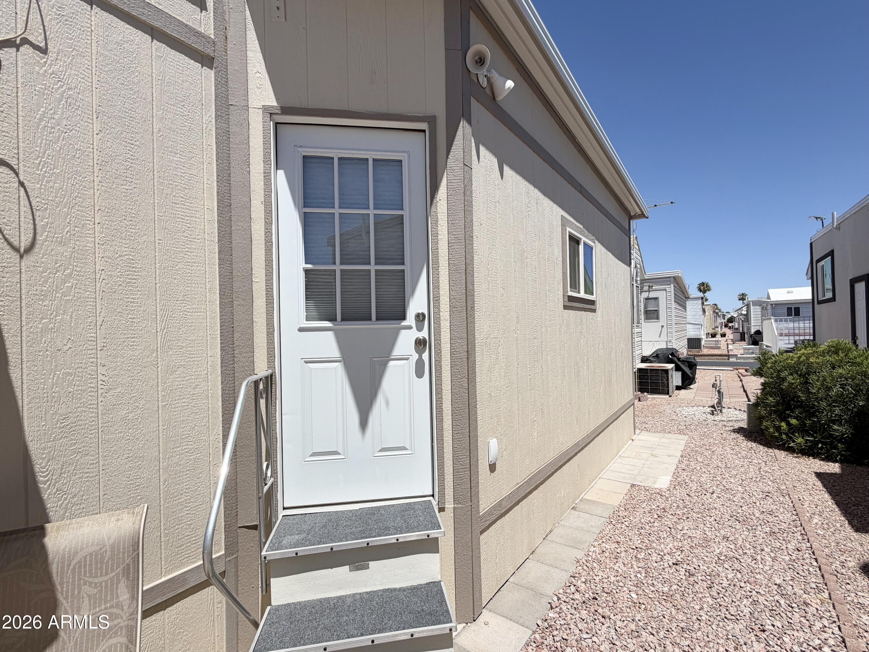 111 South Greenfield Road, Unit 244 Mesa, AZ 85206 - Photo 56 of 69 BACK PATIO ACCESS DOOR