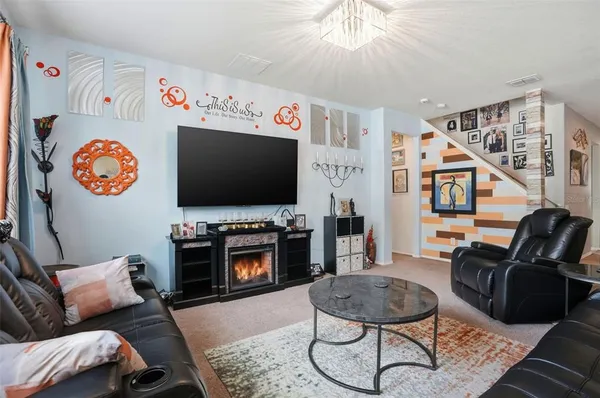 a bath tub sitting in a bathroom next to a window
