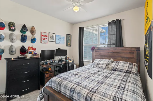 a bedroom with a bed and furniture