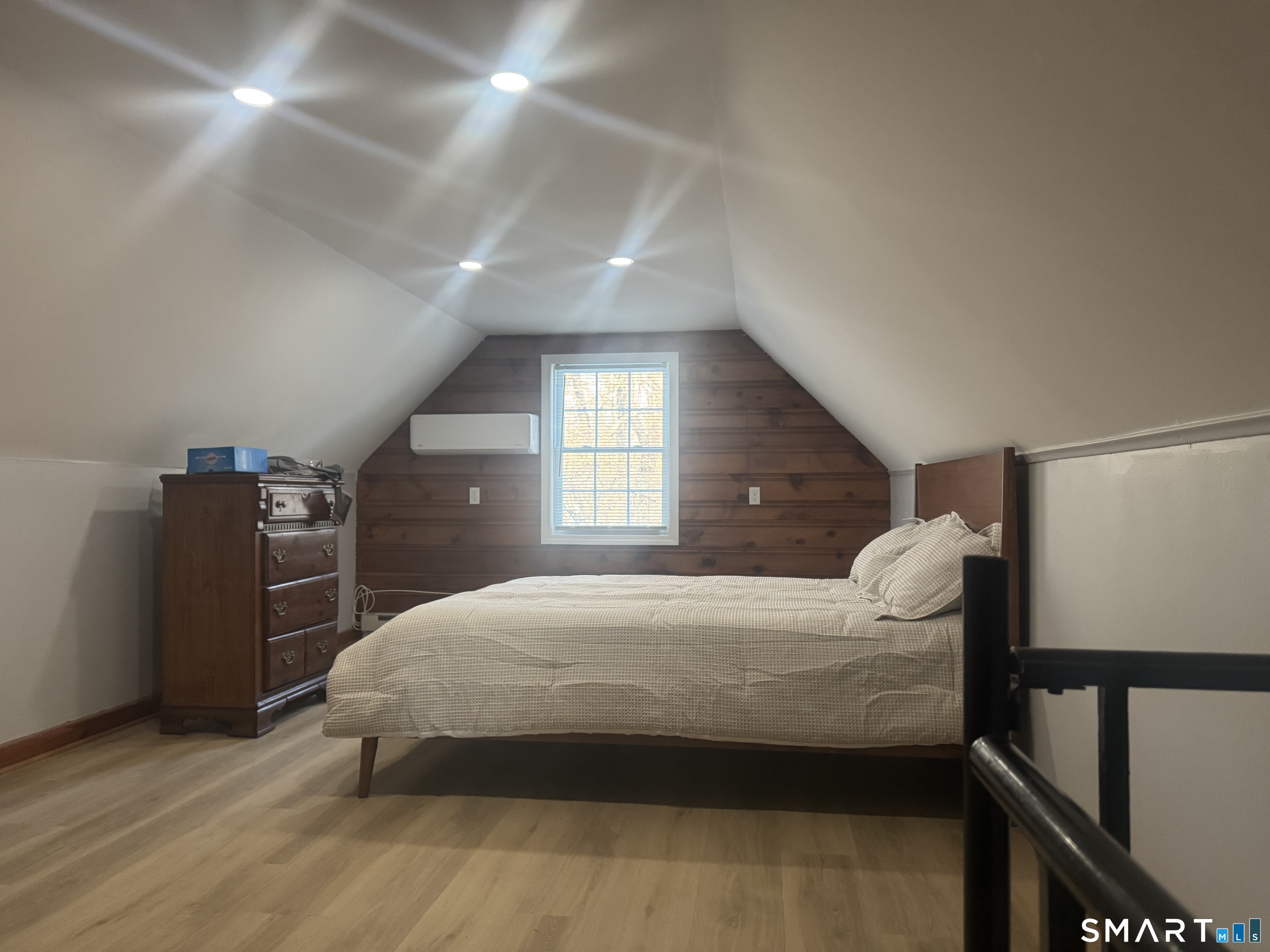 352 Hotchkiss Road Orange, CT 06477 - Photo 11 of 12 a bedroom with a bed and a closet