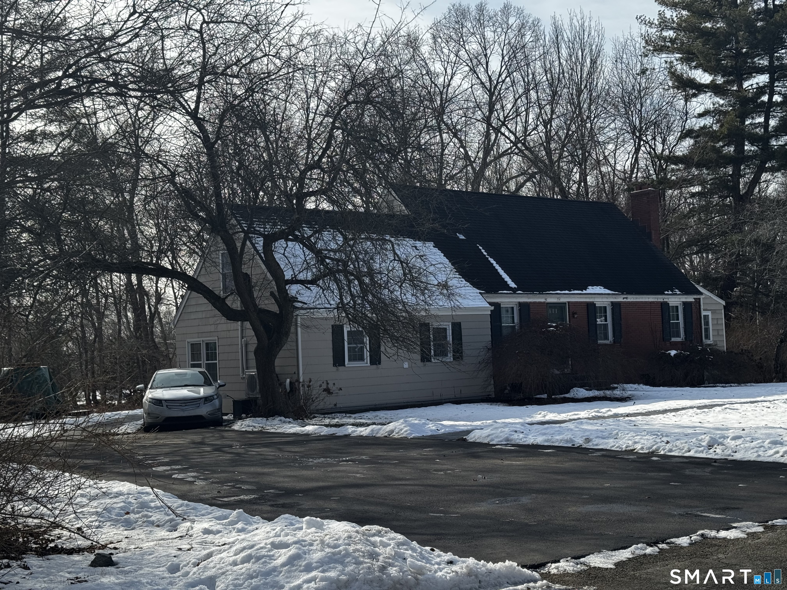352 Hotchkiss Road Orange, CT 06477 - Photo 2 of 12 a front view of house with yard
