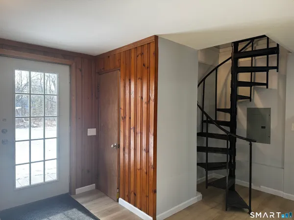 a kitchen with a sink a washer and dryer