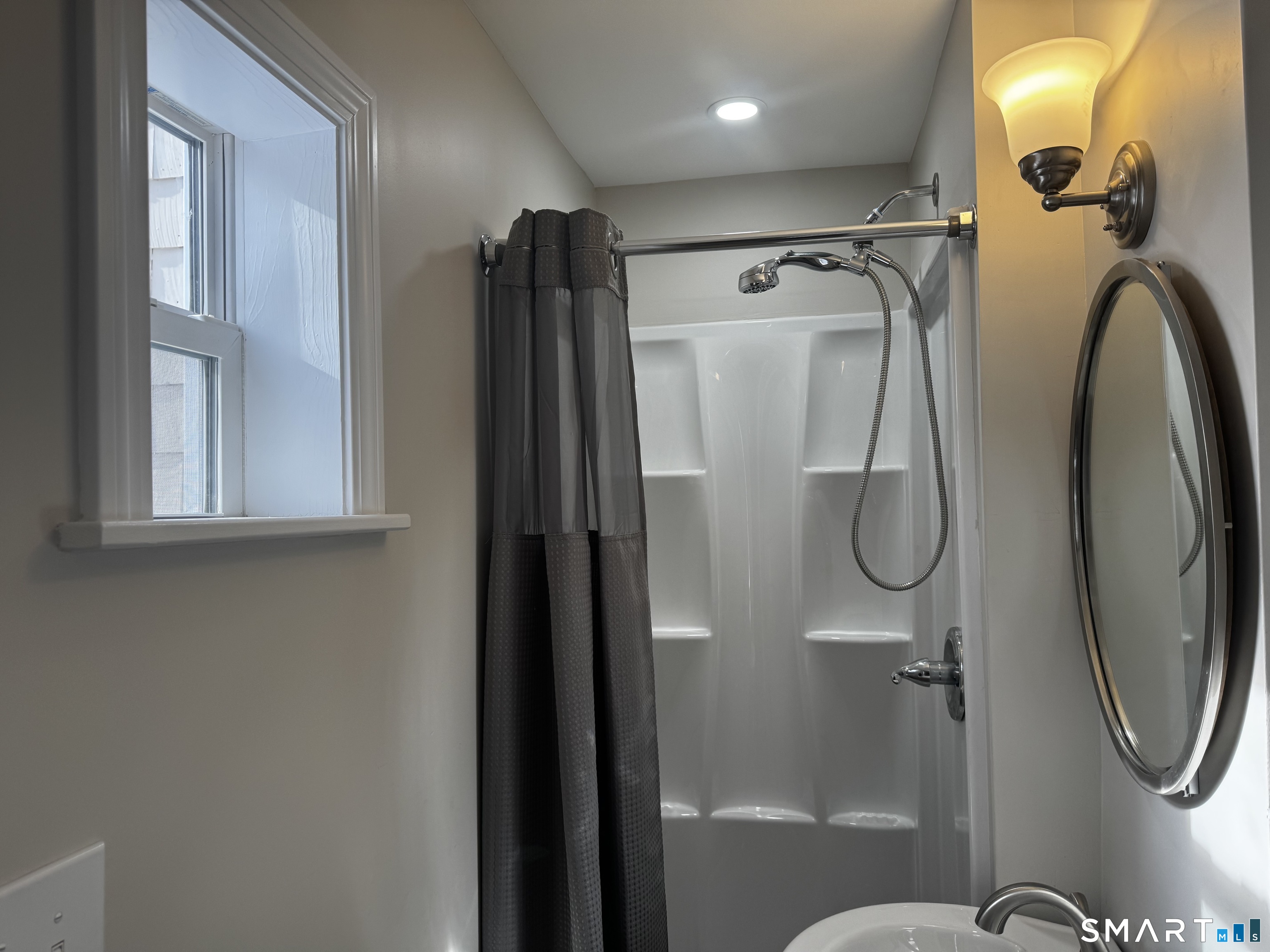352 Hotchkiss Road Orange, CT 06477 - Photo 8 of 12 a bathroom with a shower