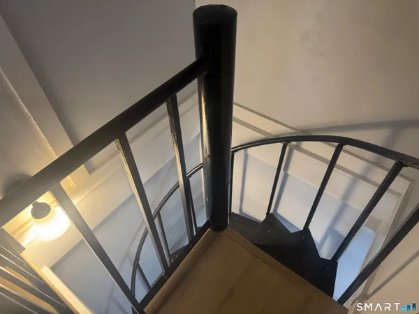 a bedroom with a bed and a closet