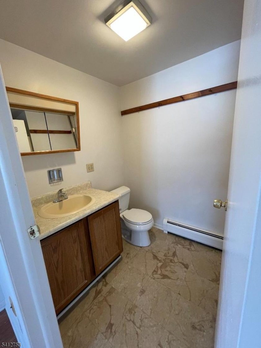 278 Morris Street Stirling, NJ 07980 - Photo 13 of 20 a bathroom with a sink mirror vanity and toilet