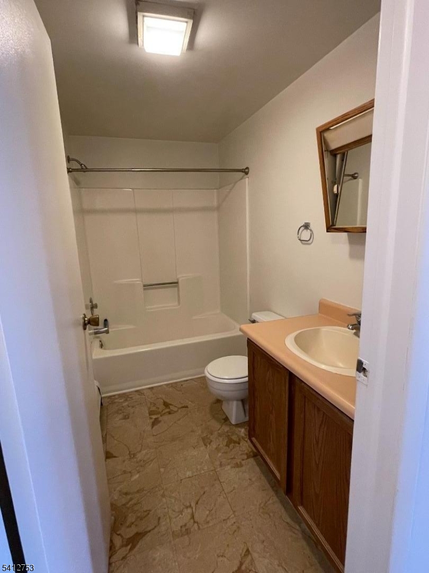 278 Morris Street Stirling, NJ 07980 - Photo 16 of 20 a bathroom with a sink a toilet and shower