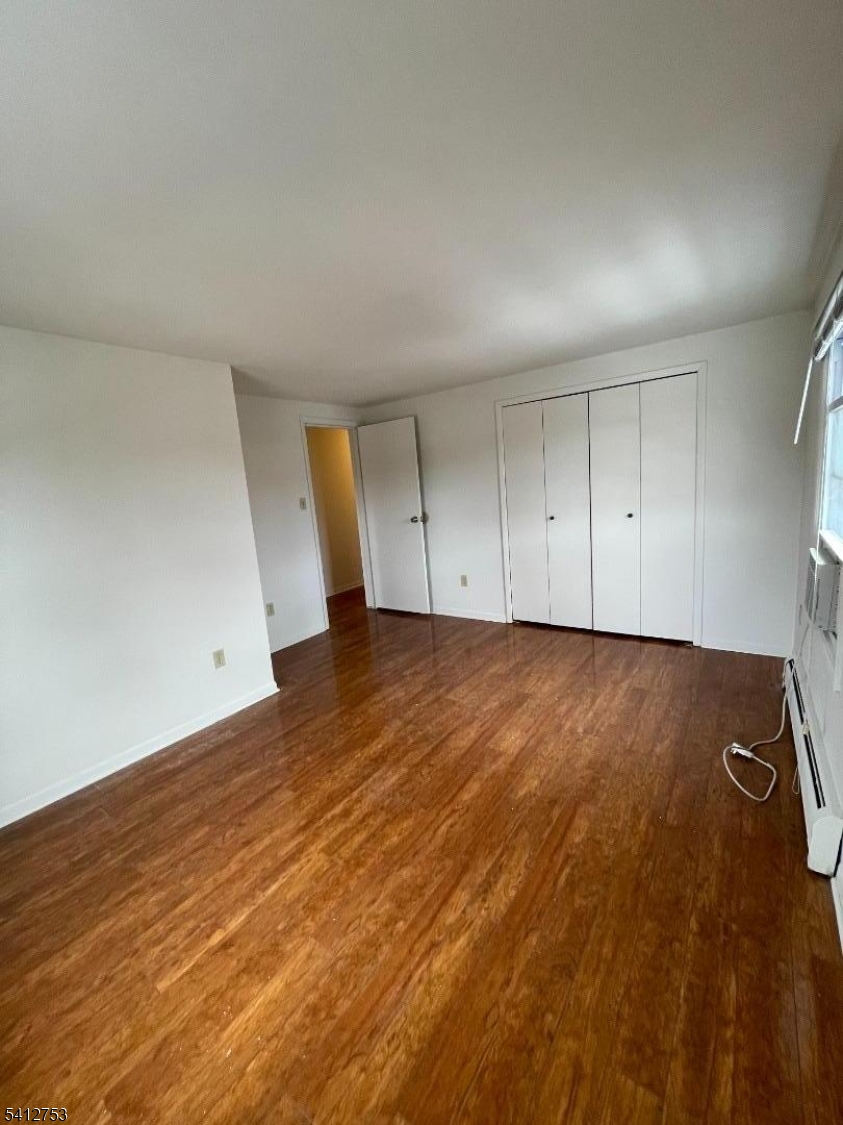 278 Morris Street Stirling, NJ 07980 - Photo 20 of 20 a view of room with wooden floor