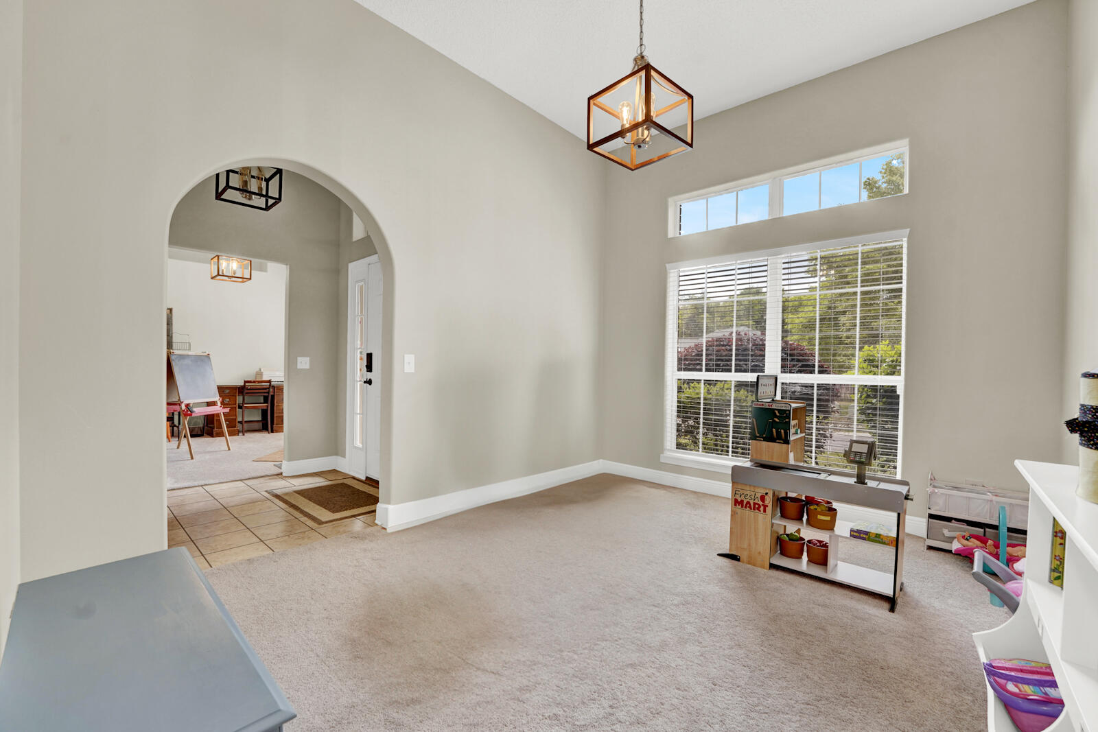 304 Greyfox Circle Crestview, FL 32536 - Photo 19 of 49 a room with gym equipment and view of living room