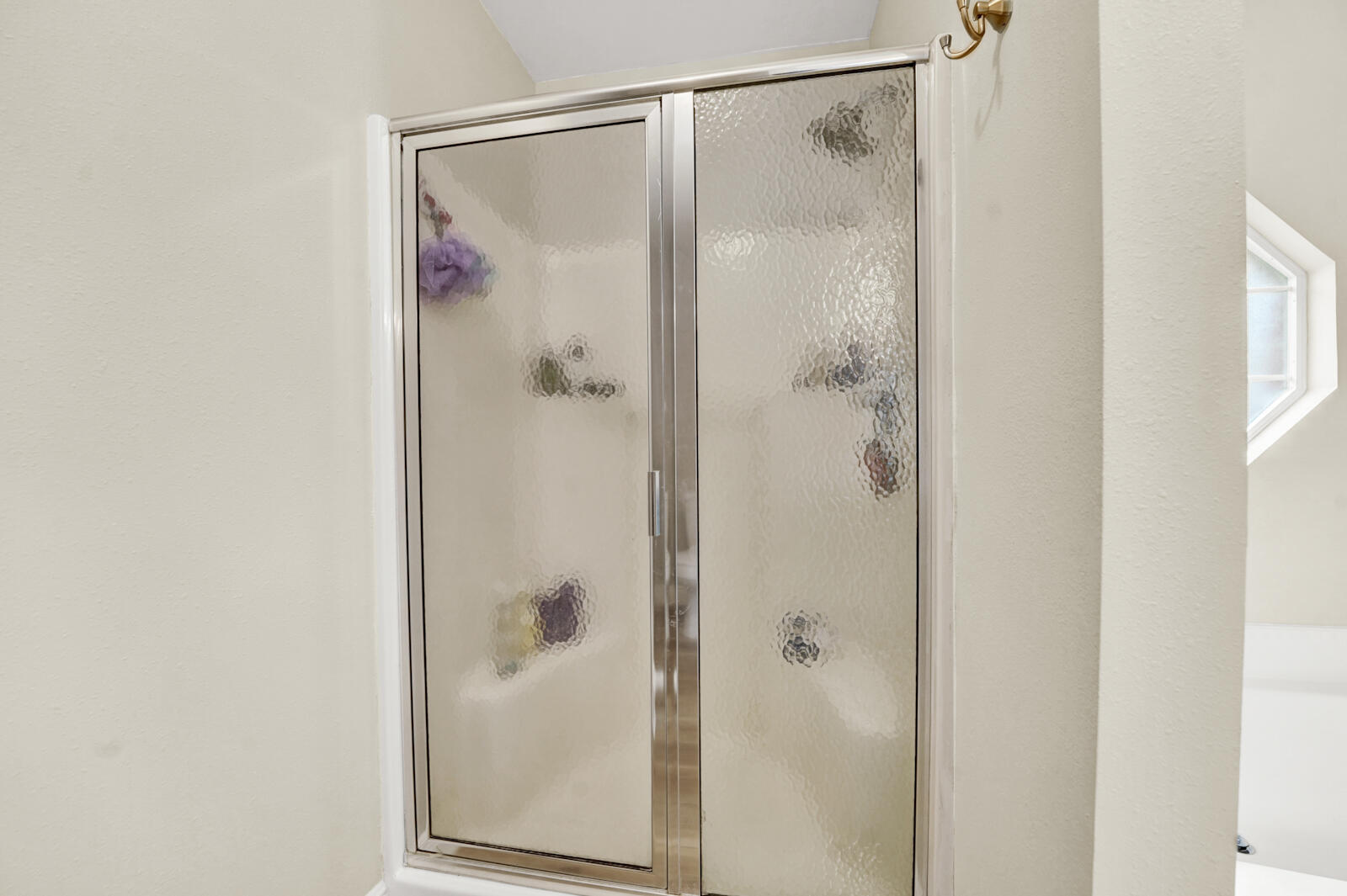 304 Greyfox Circle Crestview, FL 32536 - Photo 26 of 49 a bathroom with a glass shower door