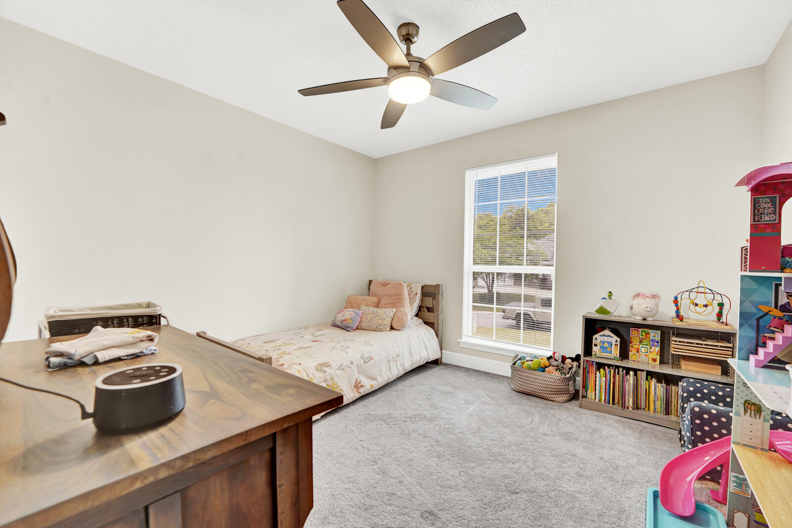 304 Greyfox Circle Crestview, FL 32536 - Photo 29 of 49 a bedroom with furniture and a book shelf