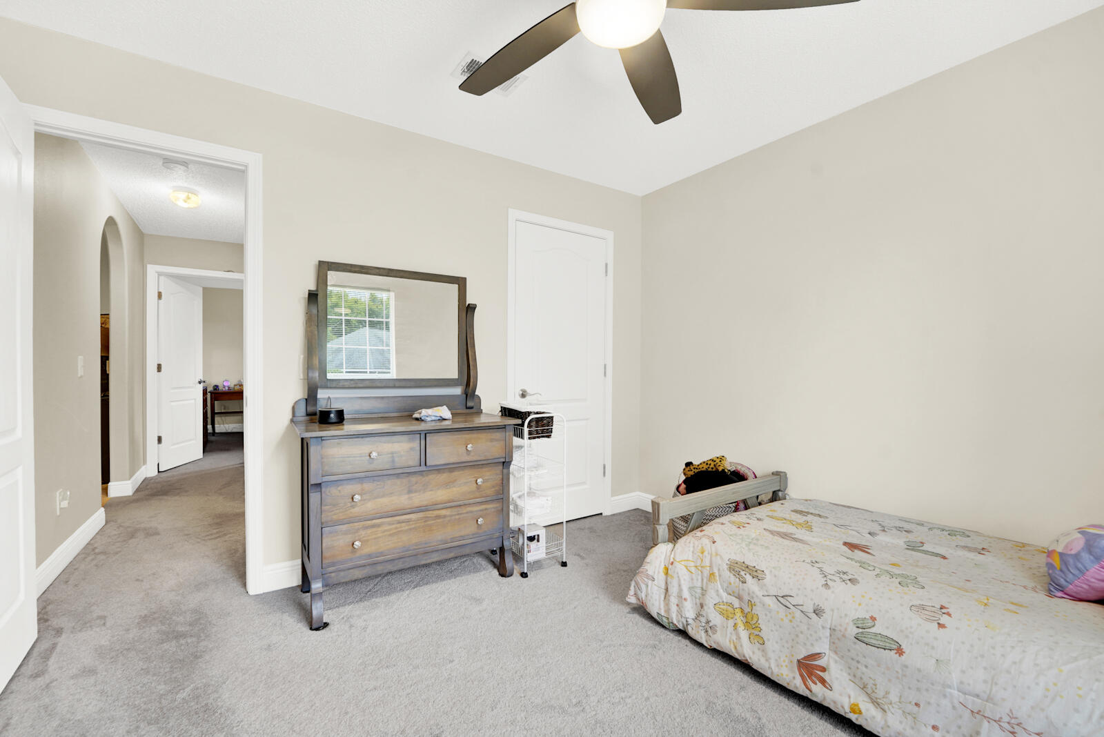 304 Greyfox Circle Crestview, FL 32536 - Photo 30 of 49 a bedroom with bed and window