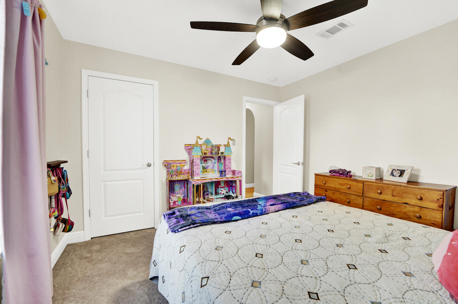 304 Greyfox Circle Crestview, FL 32536 - Photo 33 of 49 a bed room with a bed and a dresser