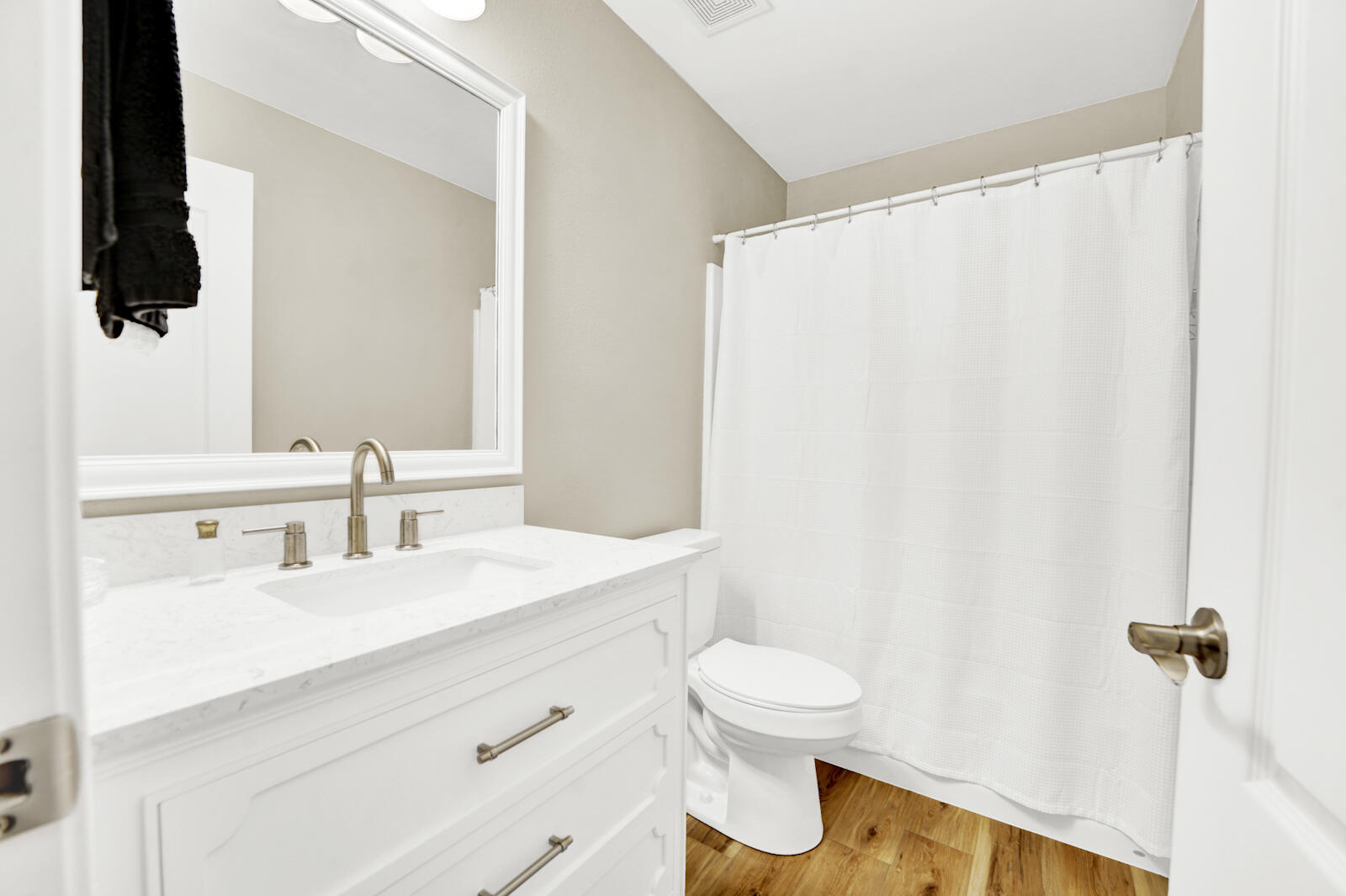 304 Greyfox Circle Crestview, FL 32536 - Photo 34 of 49 a bathroom with a sink and a mirror